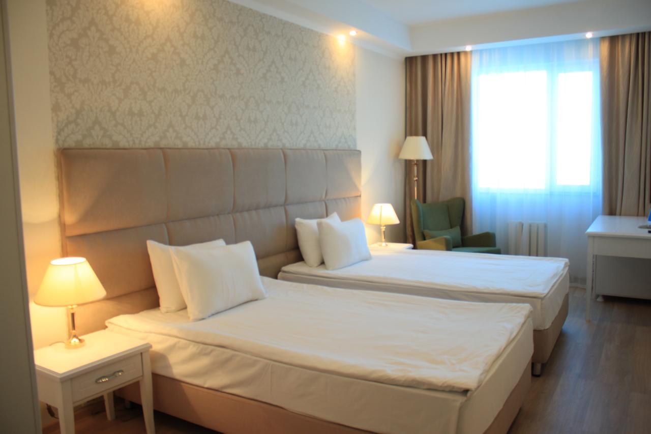 Akbulak Hotel Астана Экстерьер фото